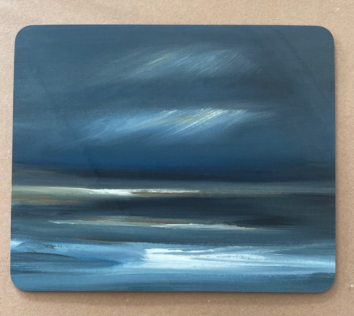 Placemat showing a painting of a rocky Scottish landscape and sea beyond.