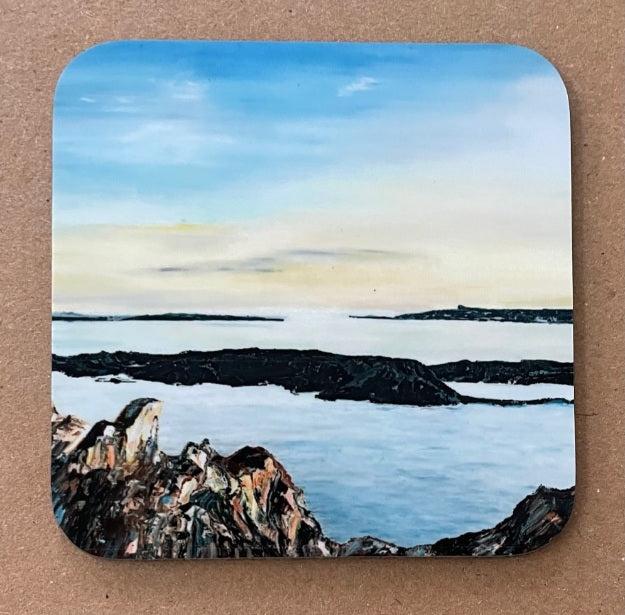 Landscape image on a coaster with Ailsa Craig in the distance.