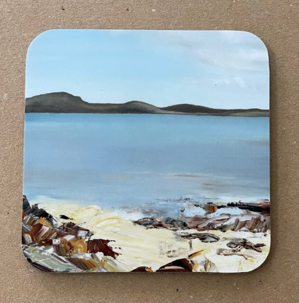 Image of a white sandy beach and azure sea on a square coaster..