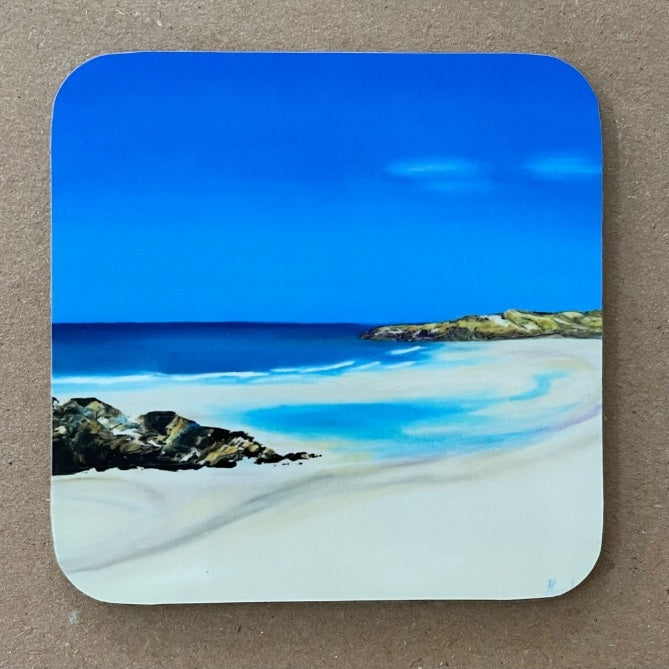 Coaster with an image of a rocky Scottish landscape and sea beyond.
