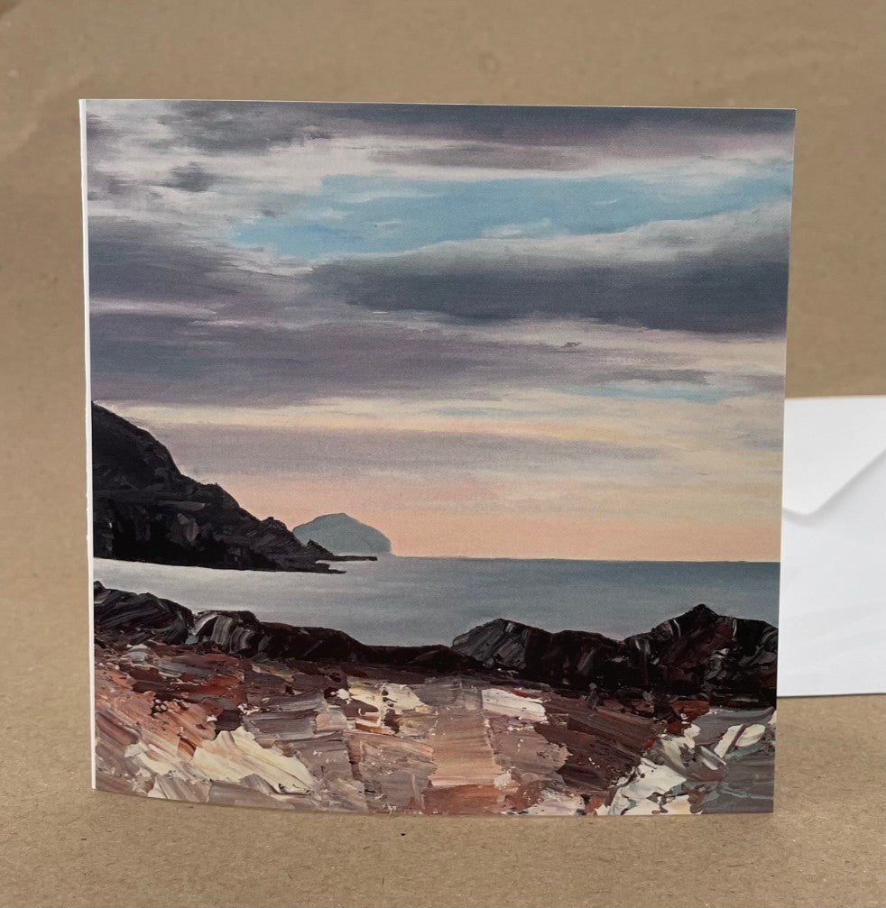 Beach and seascape scene printed on a greeting card.